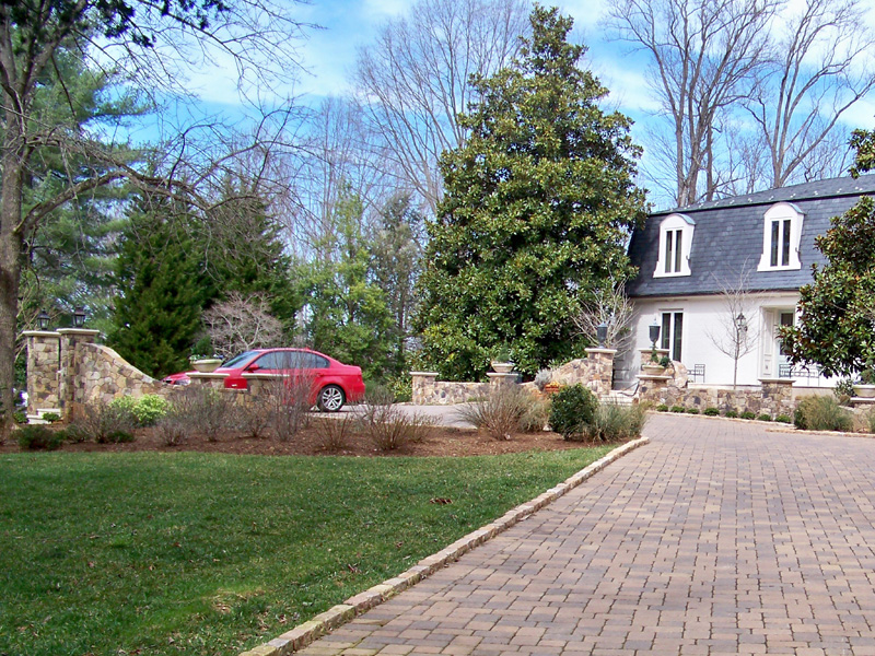 completion of the paver entrance court and driveway