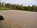 paver parking court with cobble edging