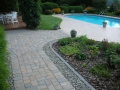 paver path edged with cobbles and chalet