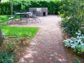 brick walkway, patio and charcoal grill enclosure